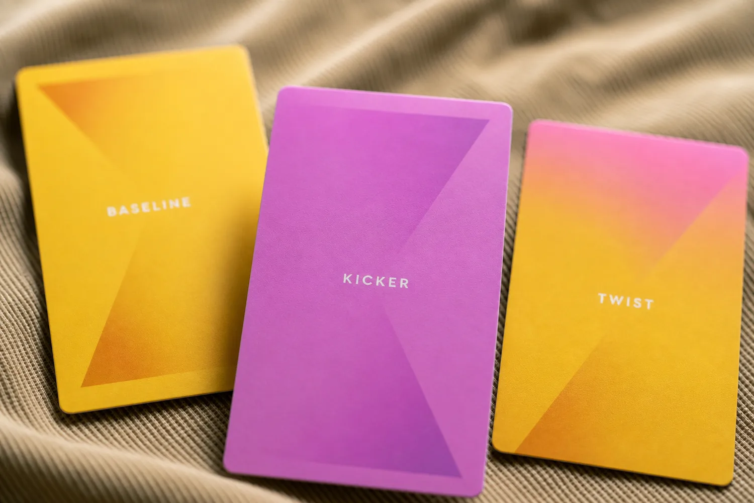Baseline, Kicker and Twist card backs on cloth