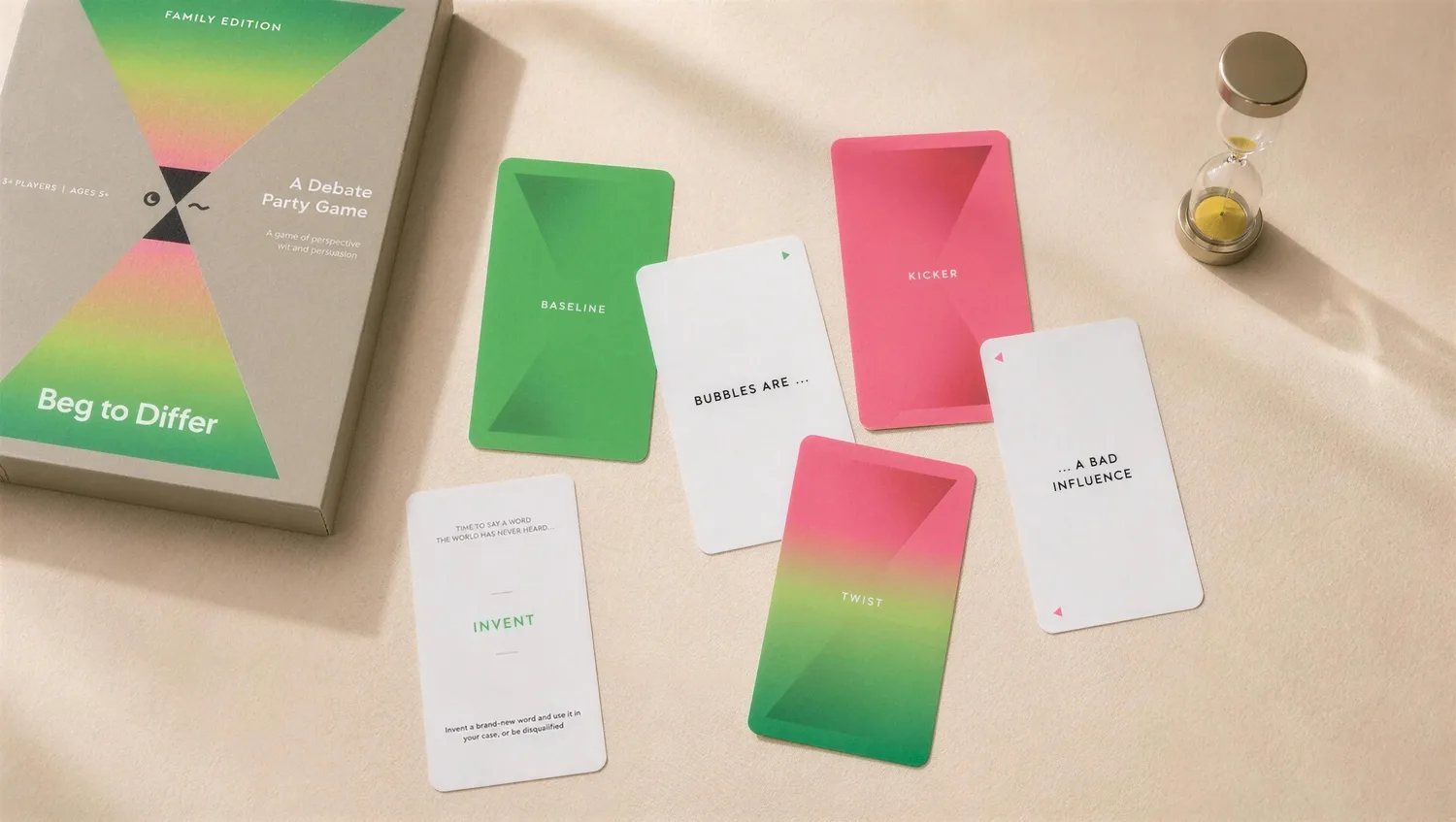 Family Edition cards in play beside the sand timer