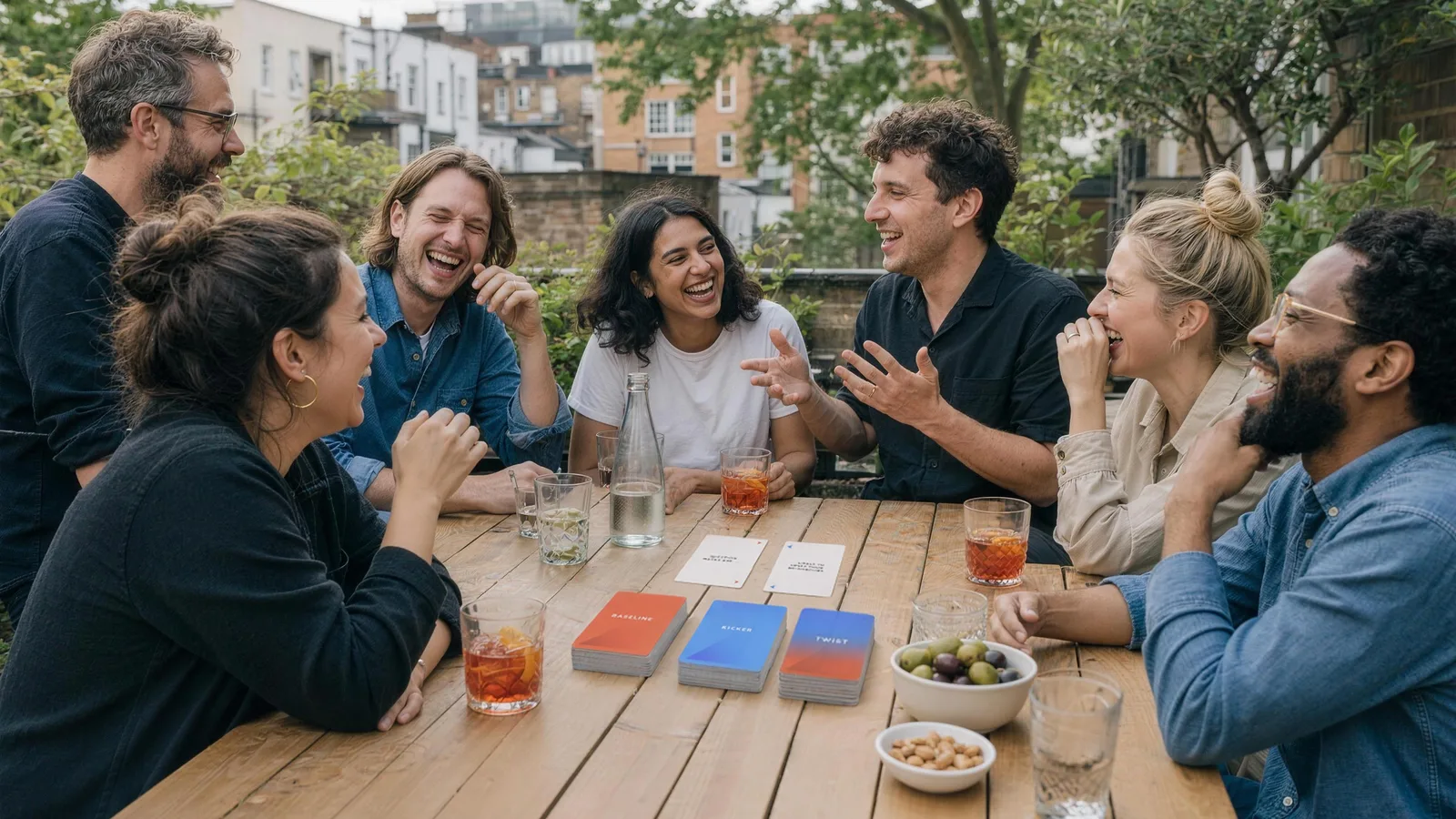 Friends around a garden table playing Beg to Differ, mid-argument and laughing